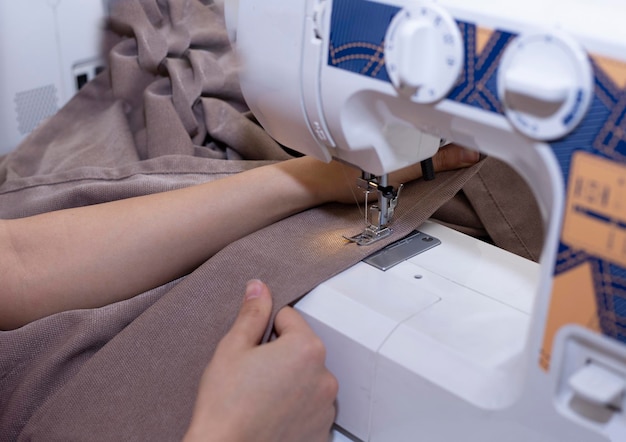 woman working a sewing machine