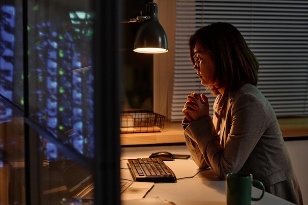 Woman working over time in office