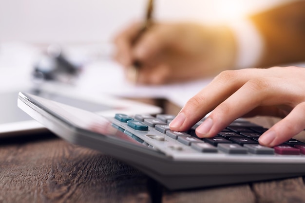 Woman works on a calculator