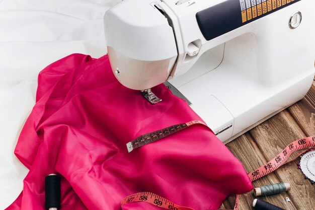 Woman works on sewing machine 