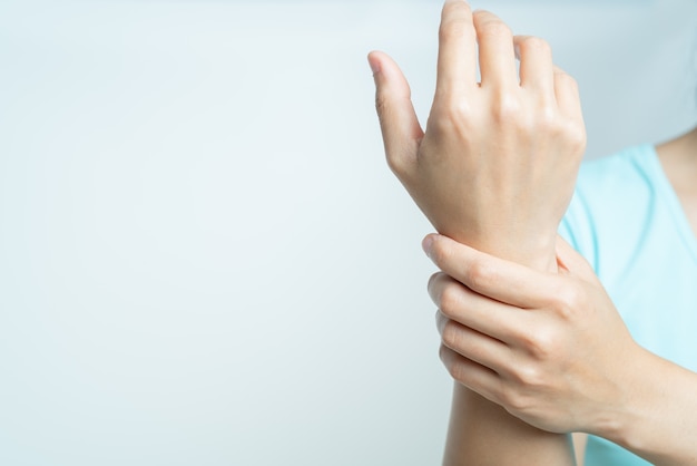 Woman wrist arm pain. office syndrome healthcare and medicine concept