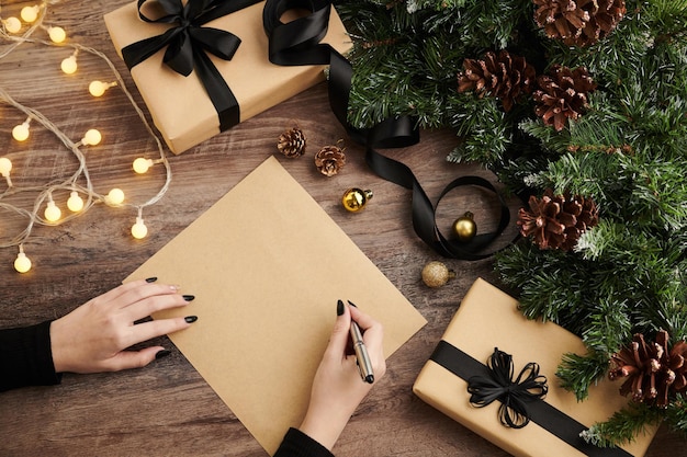 Woman Writing Christmas Letter