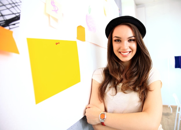 Woman writing in creative office