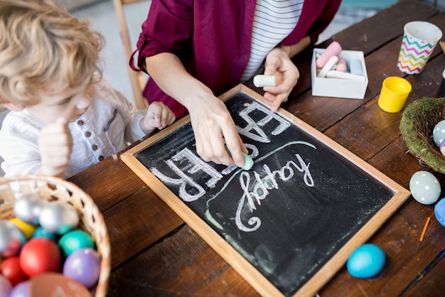 Woman Writing Happy Easter Close Up