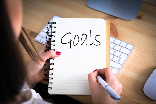 Photo woman written goals text