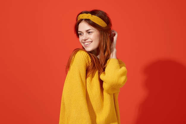Woman in yellow sweater with headband fashion hippie retro clothing high quality photo