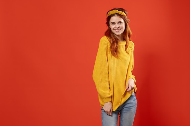 Woman in yellow sweater with headband fashion hippie retro clothing high quality photo