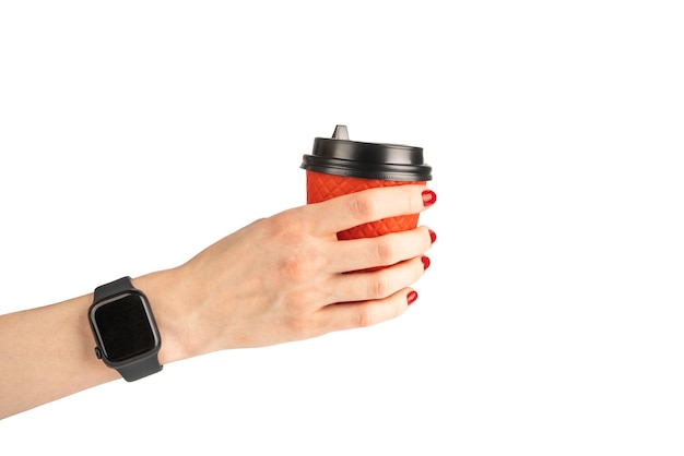 Woman39s hand holding red paper cup of coffee for take away Drink start of the day morning concept