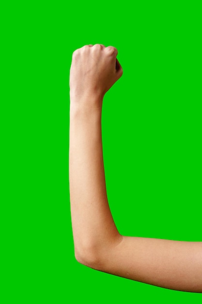 Photo womans arm with green screen background