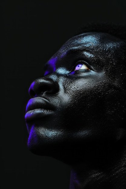 Womans Face Illuminated by Purple Light