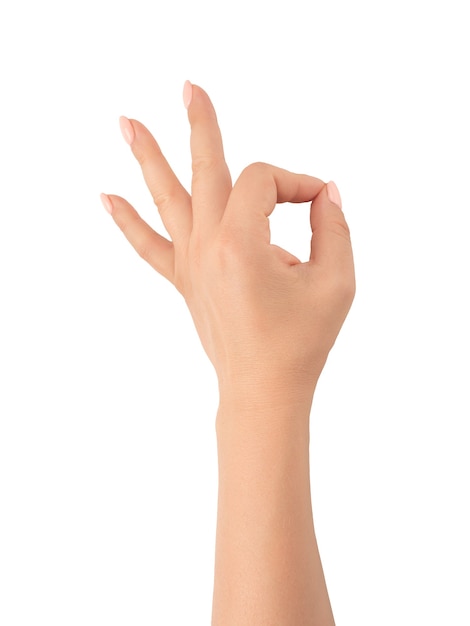 Фото Женщины рука ок знак на белом фоне. жест все в порядке. изолированный белый. женская рука показывает жест ок на белом фоне
