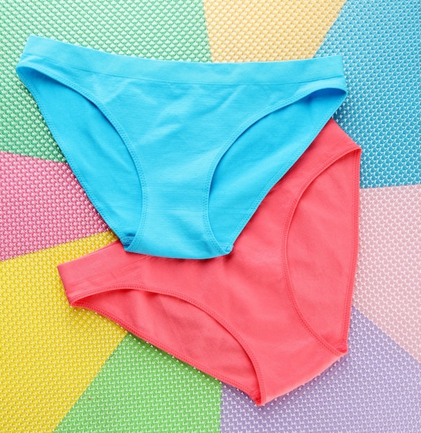 Photo womans panties on bright background