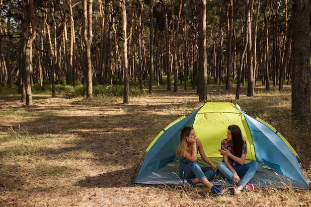 Women agreement. Tent friendship. Done work together. Morning blab