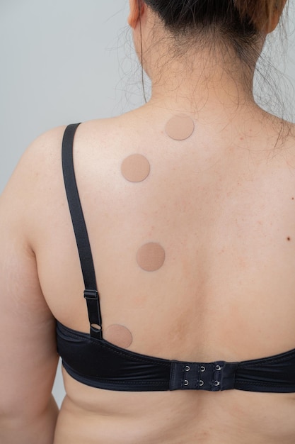 Women back with back pain patch