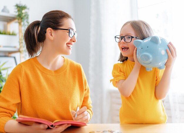 Women calculating family budget