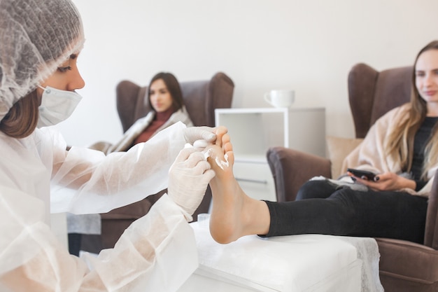 Women in a cosmetic salon doing treatment