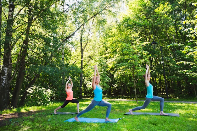 Women doing exercises outdoors