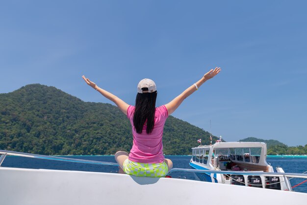 Women enjoy the fresh air and clear water at similan island ,andaman sea , phuket, thailand