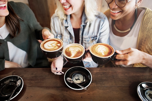 Photo women friends enjoyment coffee times concept