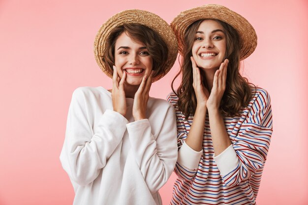 Women friends posing isolated.