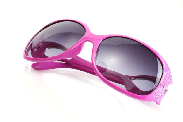 Women glamorous pink sunglasses isolated on white