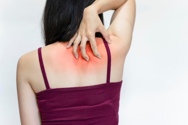 Women have back or shoulder pain from sitting incorrectly exercising or having office syndrome