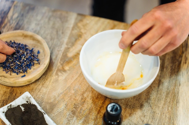 Photo women mixing ingredients to create natural handmade soaps