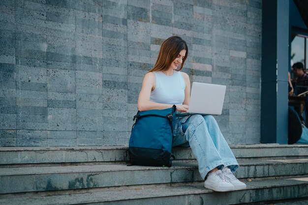 Photo women online meeting at the park work from anywhere concept