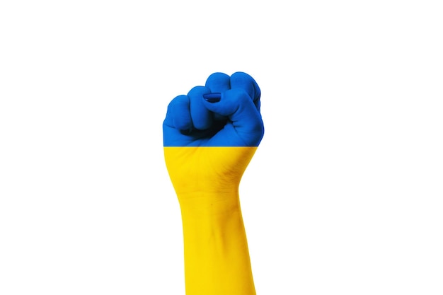 Women painted hands with the ukraine flag color making fist gesture on Ukraine flag color background