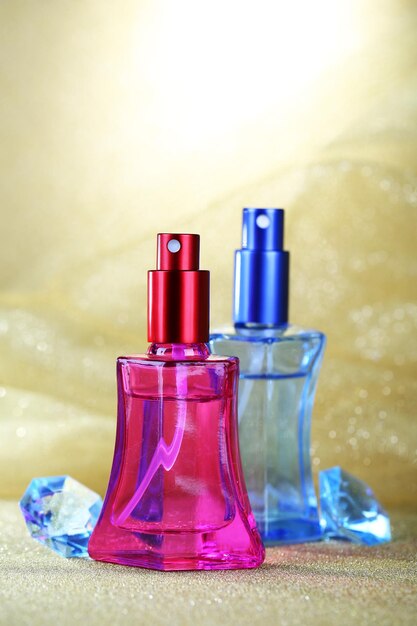 Women perfume in beautiful bottles close up