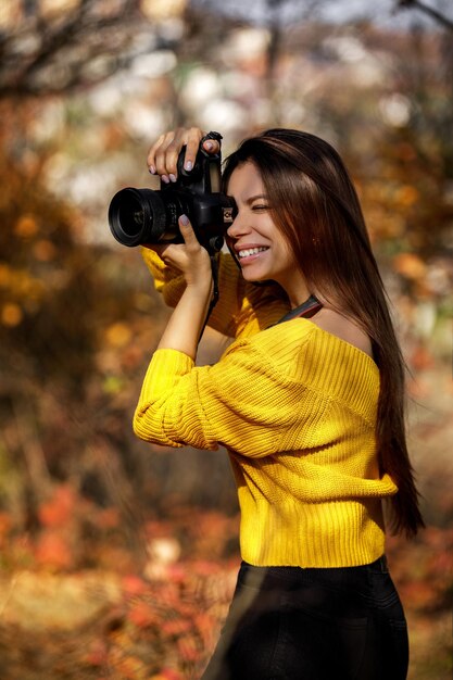 Women photographer hold camera