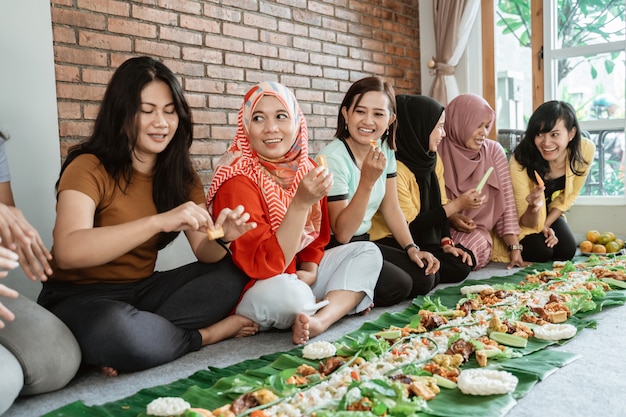 Women preparing for dinner with friends at home