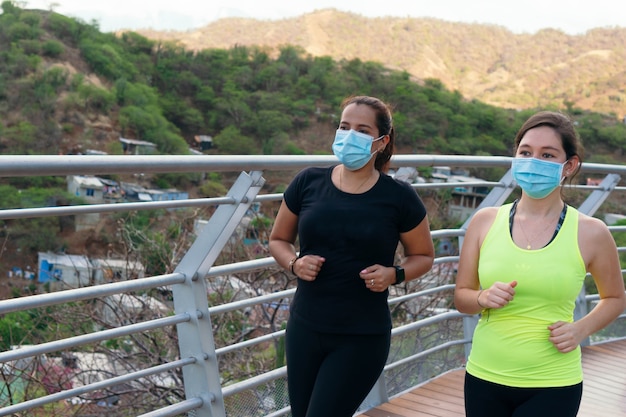 Women in protective mask training in the city