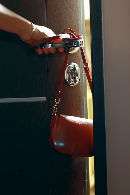 women's bag at the door