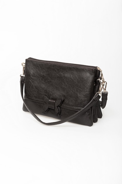Women's black leather bag isolate on a white background front view