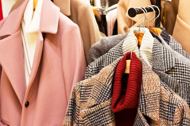 Women's coat on a hanger in a clothing store