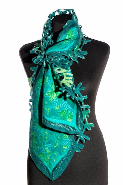 Women's emerald scarf of felted wool on a mannequin