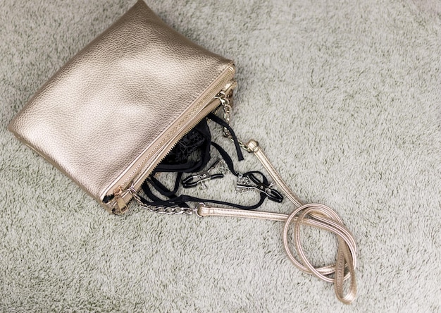 A women's handbag with fallen love toys