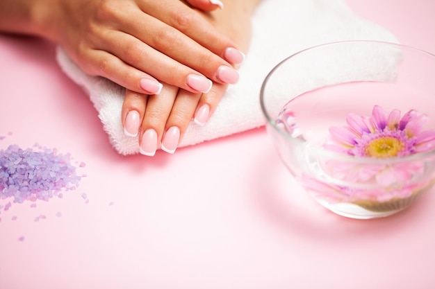 Women's hands with a new manicure.