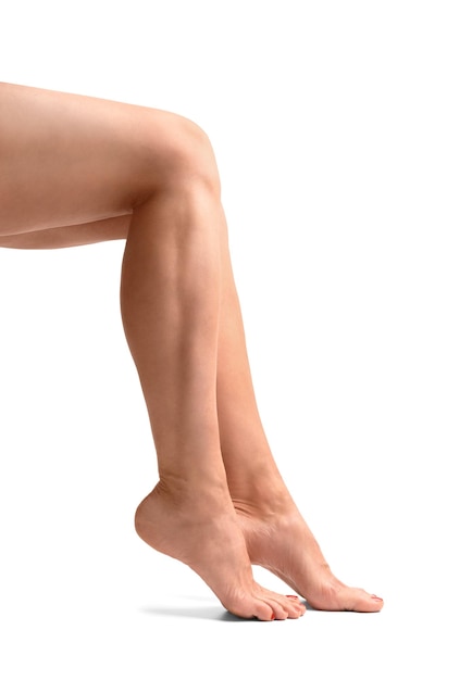 Women's legs on a white background