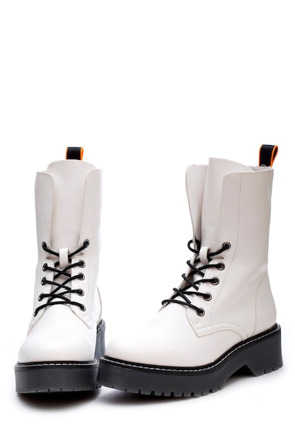 Women's white boots with thick soles on a white background