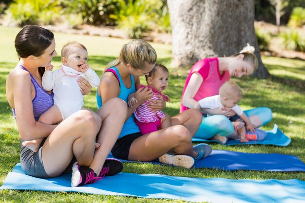 Women sitting with their babies