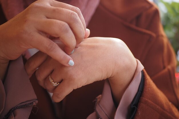 women suffering from itching skin close up