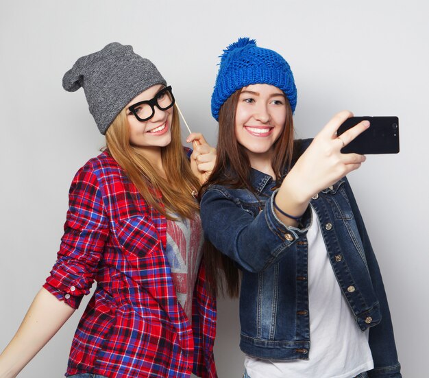 Women taking selfie