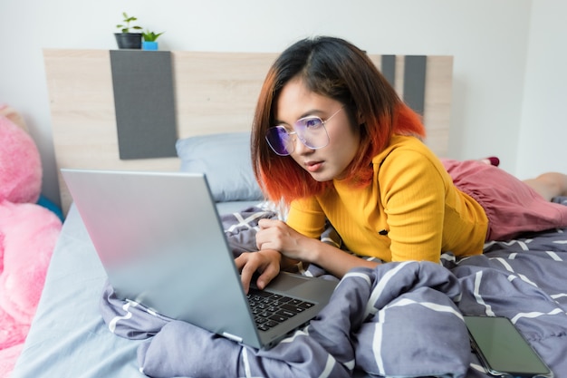 Women use laptop working from home.