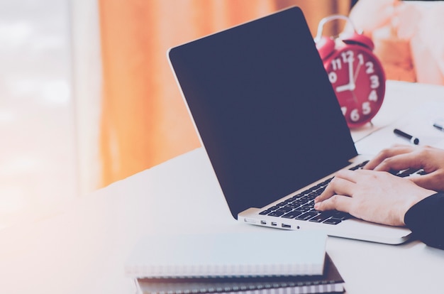 women using laptop in office