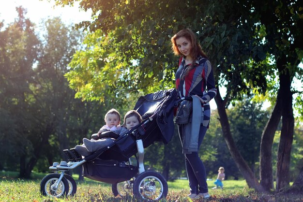 Women walk stroller summer