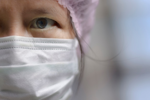 Women wear face masks in clean rooms