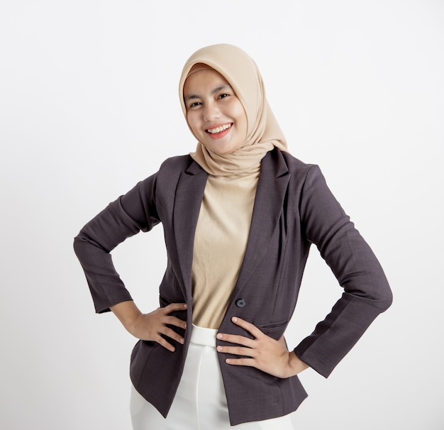 Women wearing suits hijab cheerful ready to work, hand on waist, formal work concept isolated