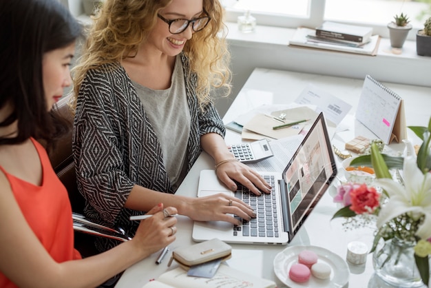 women working on small business